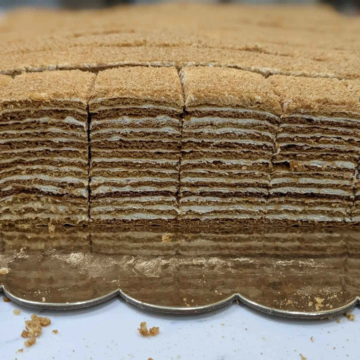 Medovik honey layer cake with crumb coating