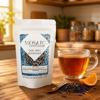 Earl Grey Moonlight tea pouch with a cup of Earl Grey tea