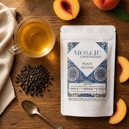 Peach Oolong tea pouch flat lay with loose oolong and fresh peaches